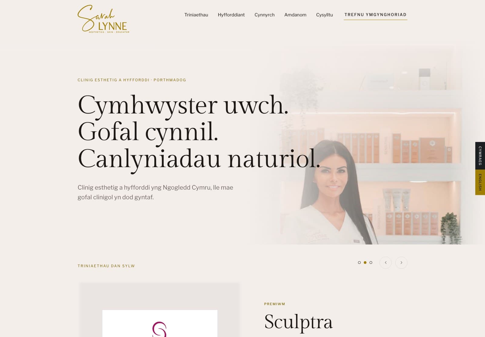 The Sarah Lynne Aesthetics website homepage, warm paper tones with a gold script logo and black serif headings